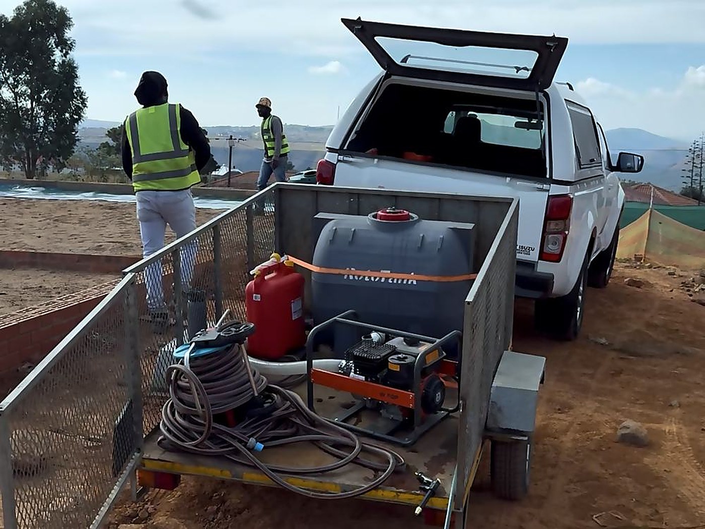 Tank, pump and sprayer travel with the team so the mix is made on site at the right rate.